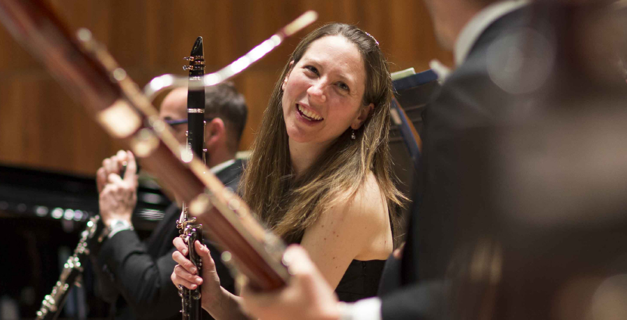 RPO Player Sonia Sielaff smiling and holding her clarinet.