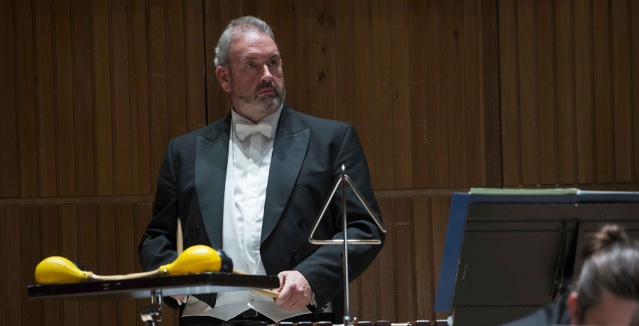 RPO Player Stephen Quigley playing percussion in concert.