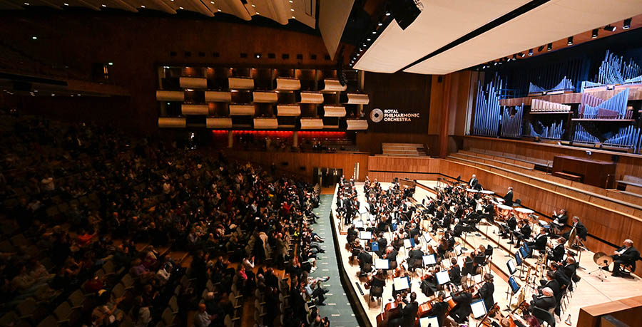 A wide shot of the RPO on stage at the Royal Festival Hall