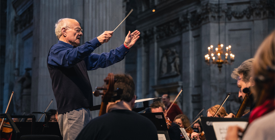 John Rutter conducting the Orchestra in rehearsal