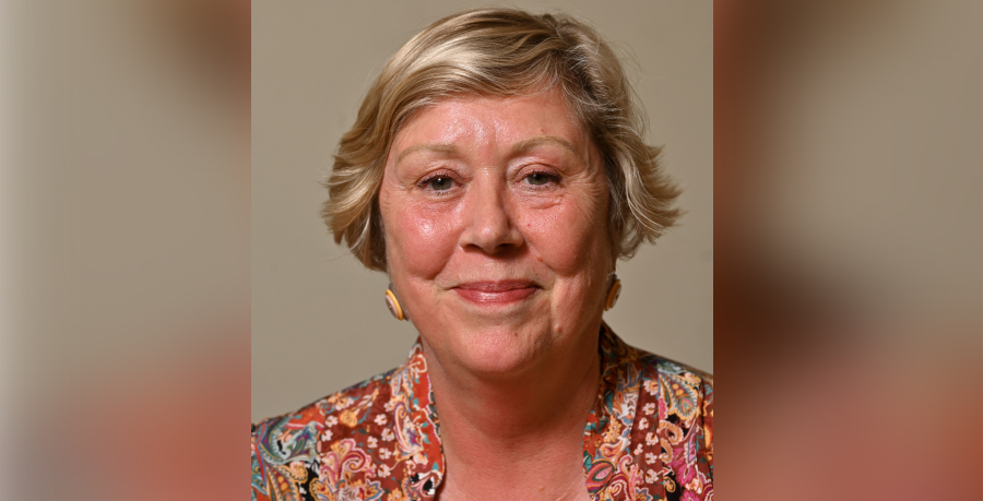 A portrait photo of Louise Badger smiling at the camera