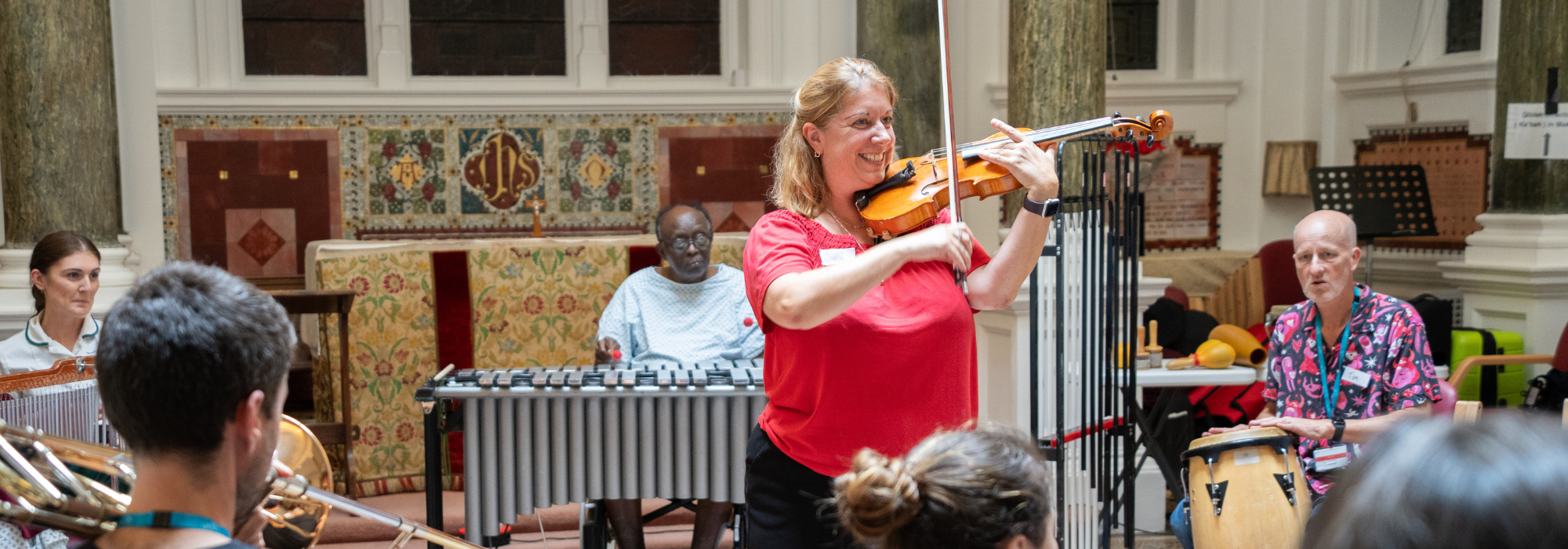 Musicians and participants at STROKESTRA workshop