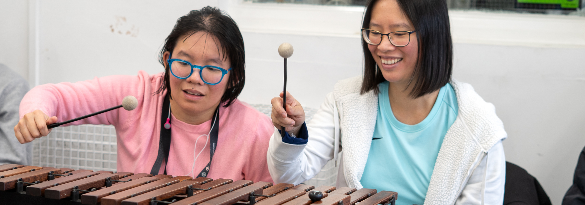 Community members participating in music making