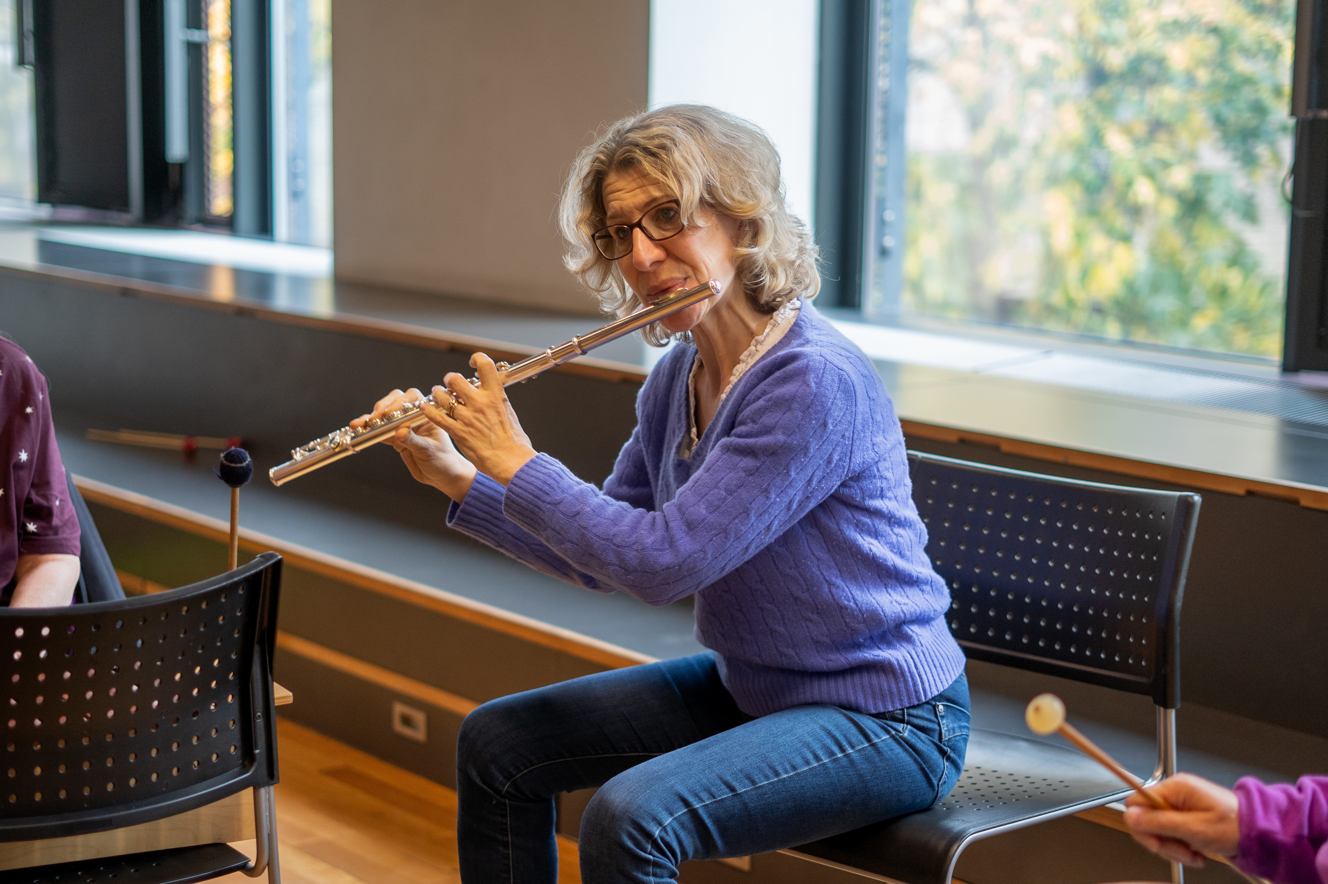 Joanna Marsh playing the flute.
