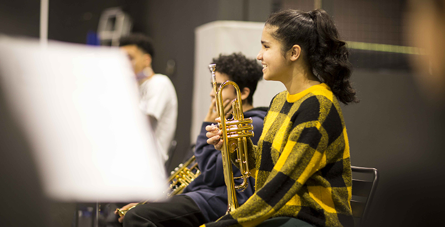 An image of young people playing instruments at the launch event. Credit: Ben Wright