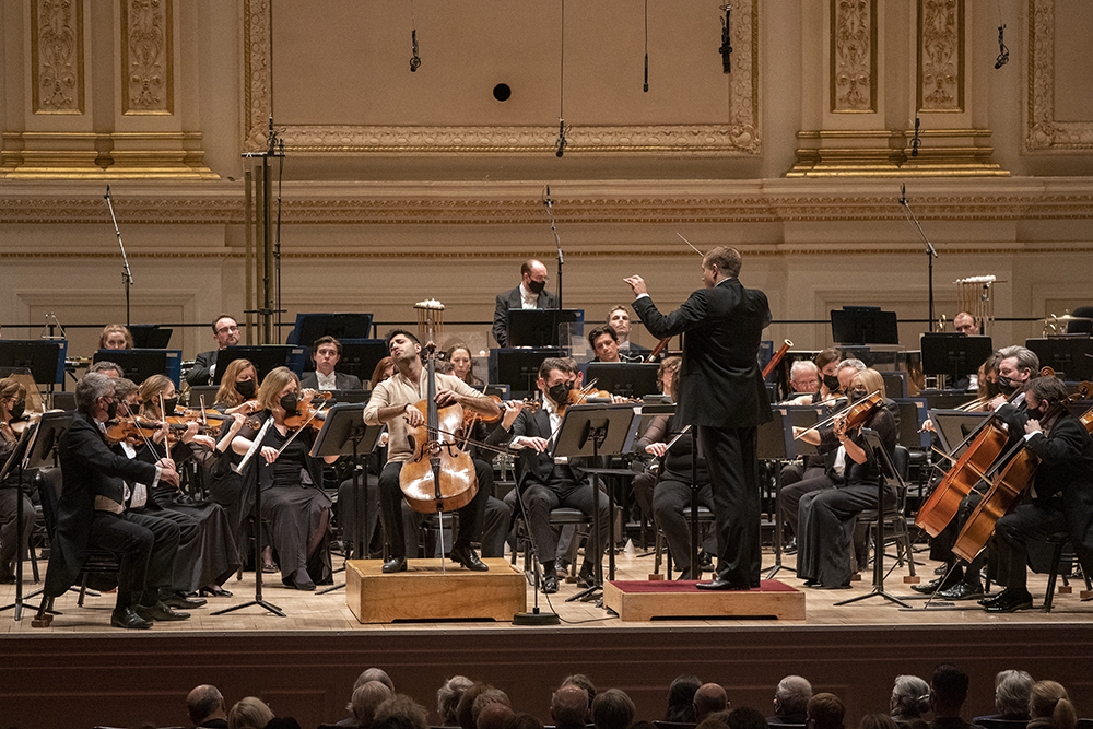 An image of the RPO on stage at Carnegie Hall with Vasily Petrenko conducting and Kian Soltani playing cello. Credit Richard Termine