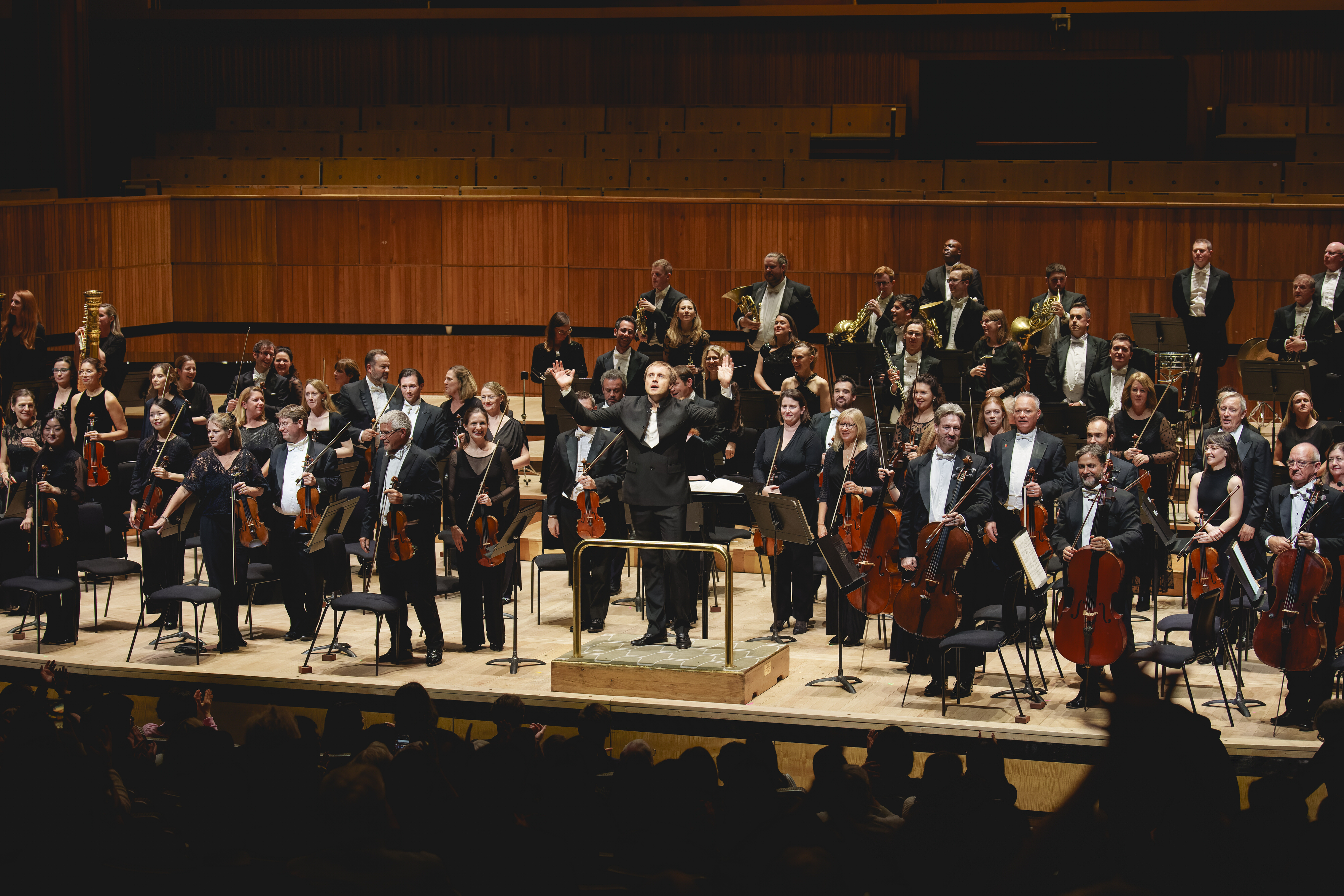 The RPO and Vasily Petrenko recieving applause on stage