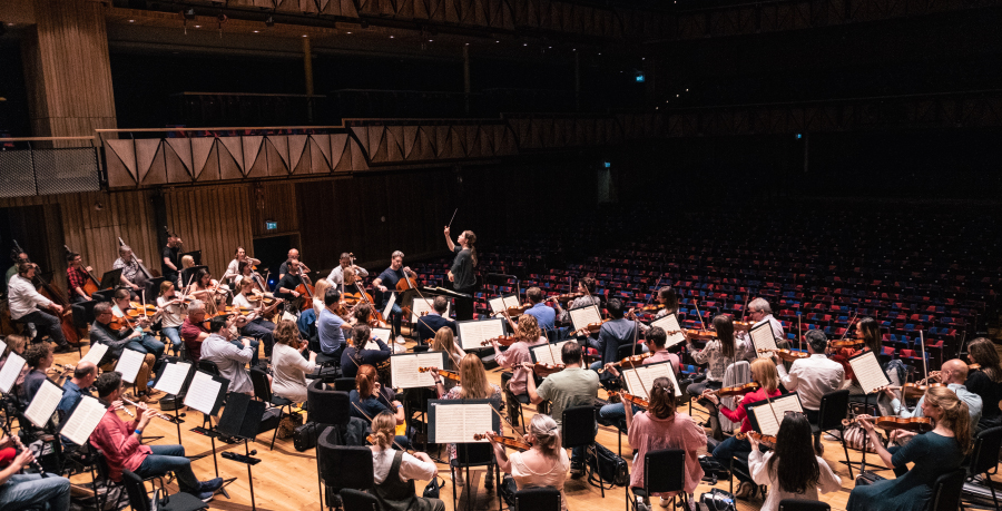 Emilia Hoving conducts the Orchestr ain rehearsal at Bristol Beacon