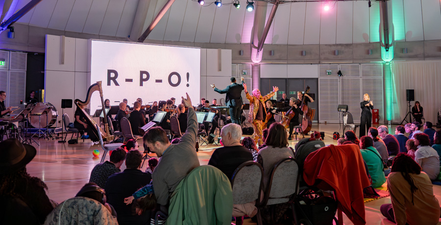 Audience in front of stage of a Relaxed Orchestra Performance