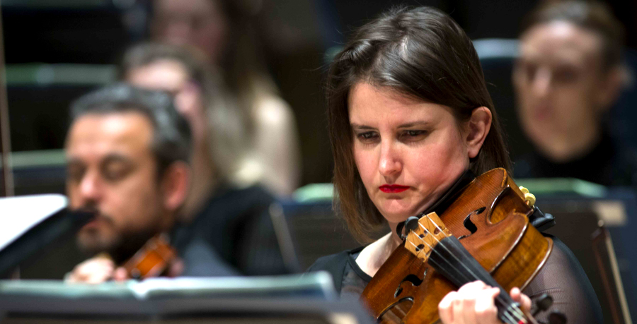 RPO Player Abigail Fenna playing the viola in concert.