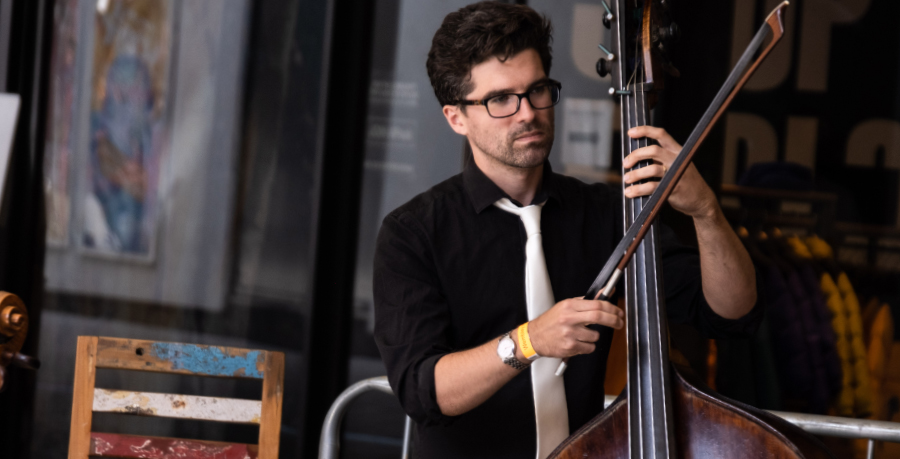 RPO Player Ben Wolstenholme playing the double bass.