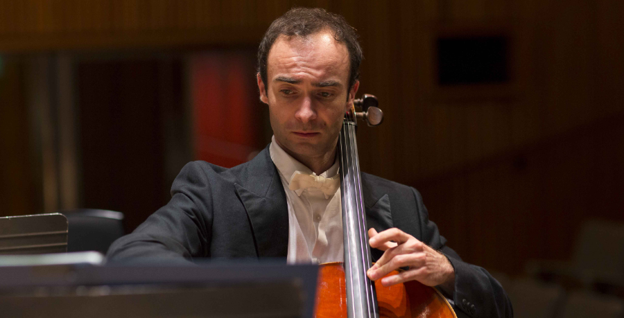 RPO Player Jean-Baptiste Toselli playing the cello in concert.