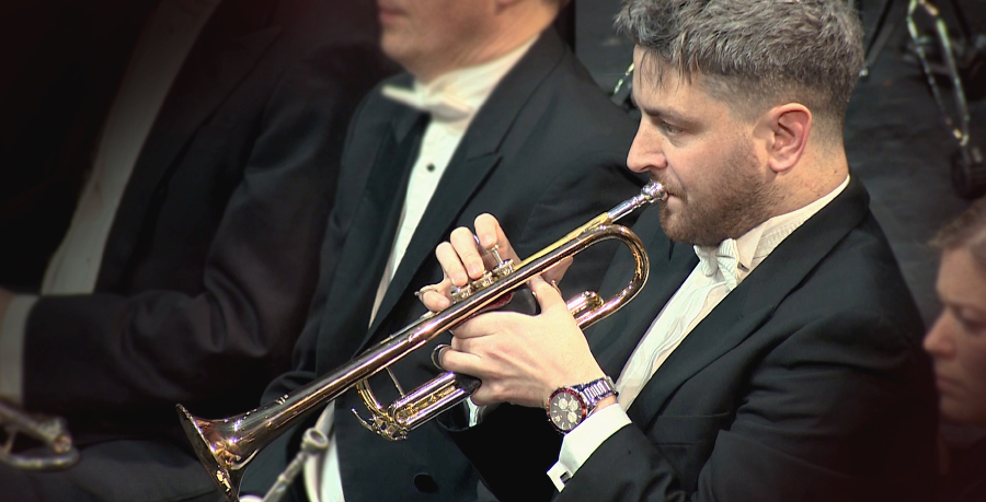 RPO Player Matthew Williams playing the trumpet in concert.