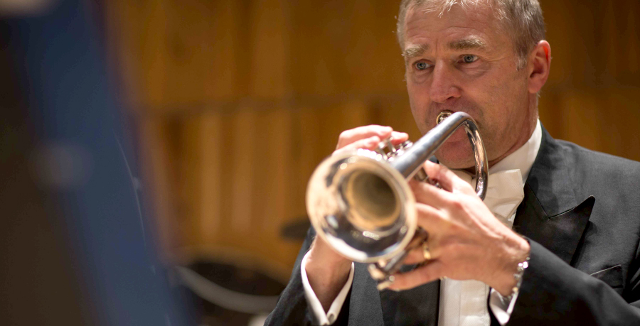 RPO Player Mike Allen playing the trumpet in concert.