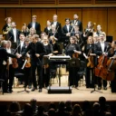 Vasily Petrenko shaking hands with leader Duncan Riddell at the end of an RPO concert at the Miami Arsht Center.