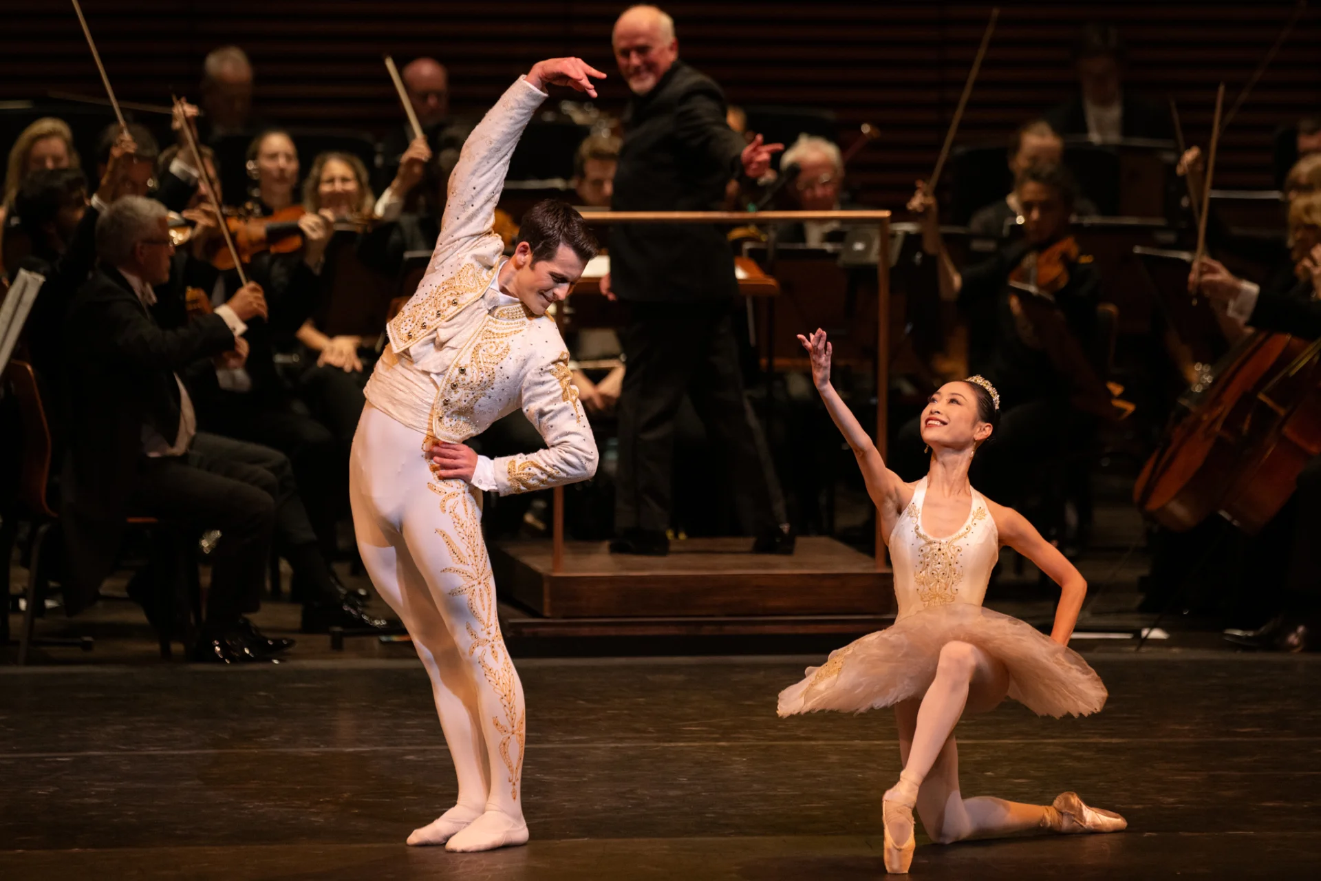 RPO performing with the Birmingham Ballet featuring two ballet dancers in the foreground at the Dr Phillips Centre