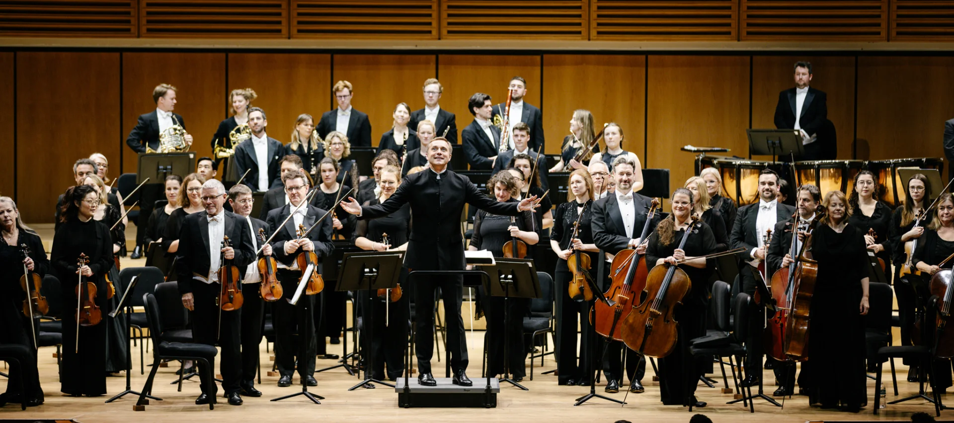 The RPO and Vasily Petrenko receiving applause after a concert at the Miami Arsht Center.
