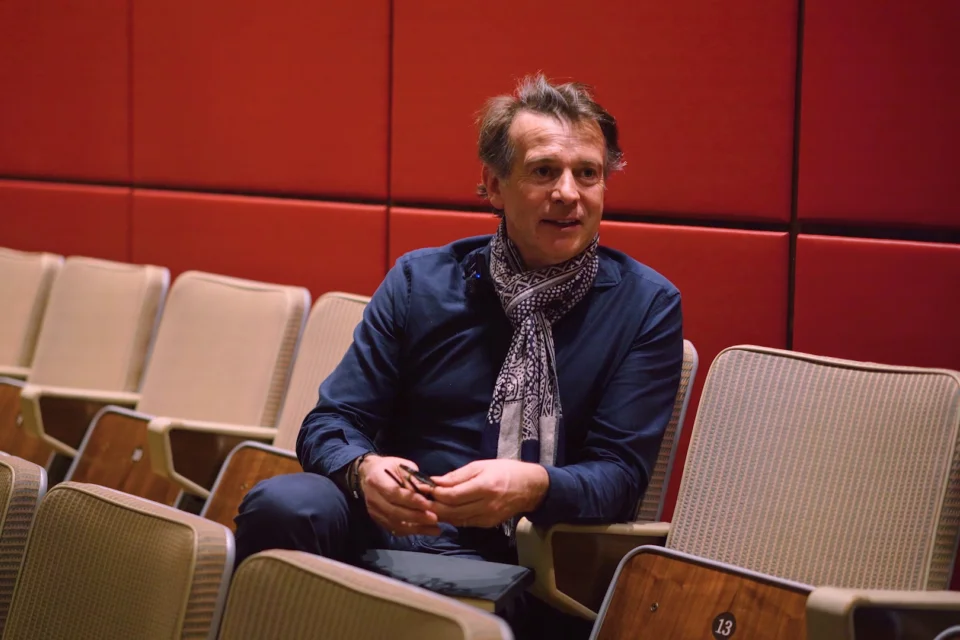 Jeremy Houghton seated in the Royal Festival Hall auditorium