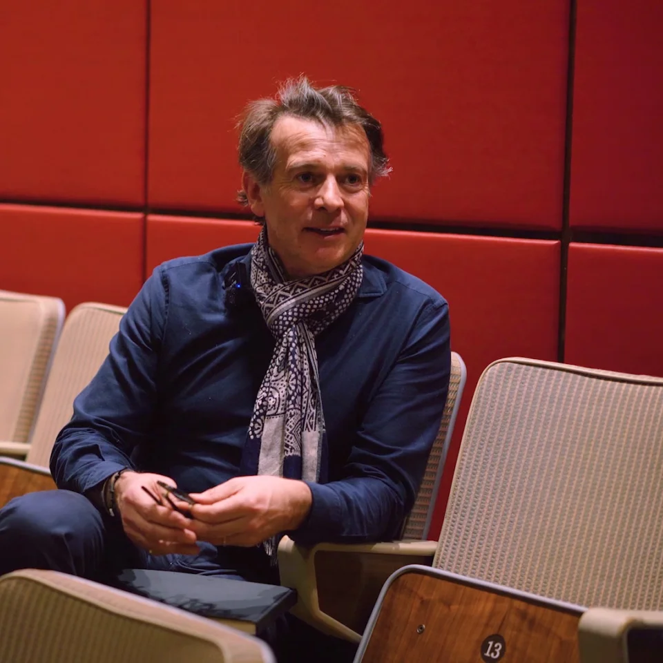 Jeremy Houghton seated in the Royal Festival Hall auditorium