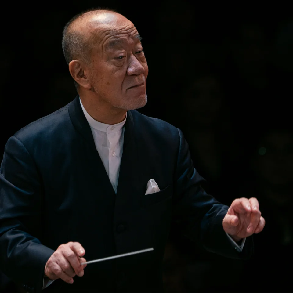 A photo of Joe Hisaish conducting