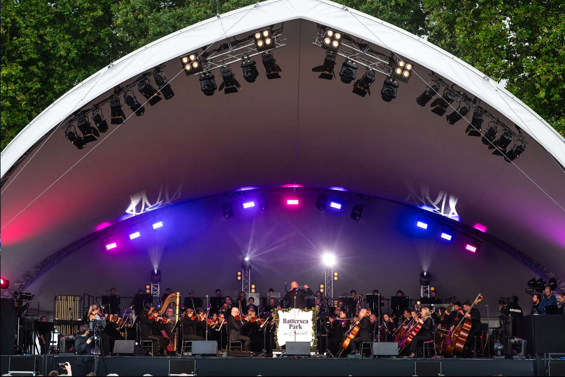 The RPCO performing on stage at Battersea Park