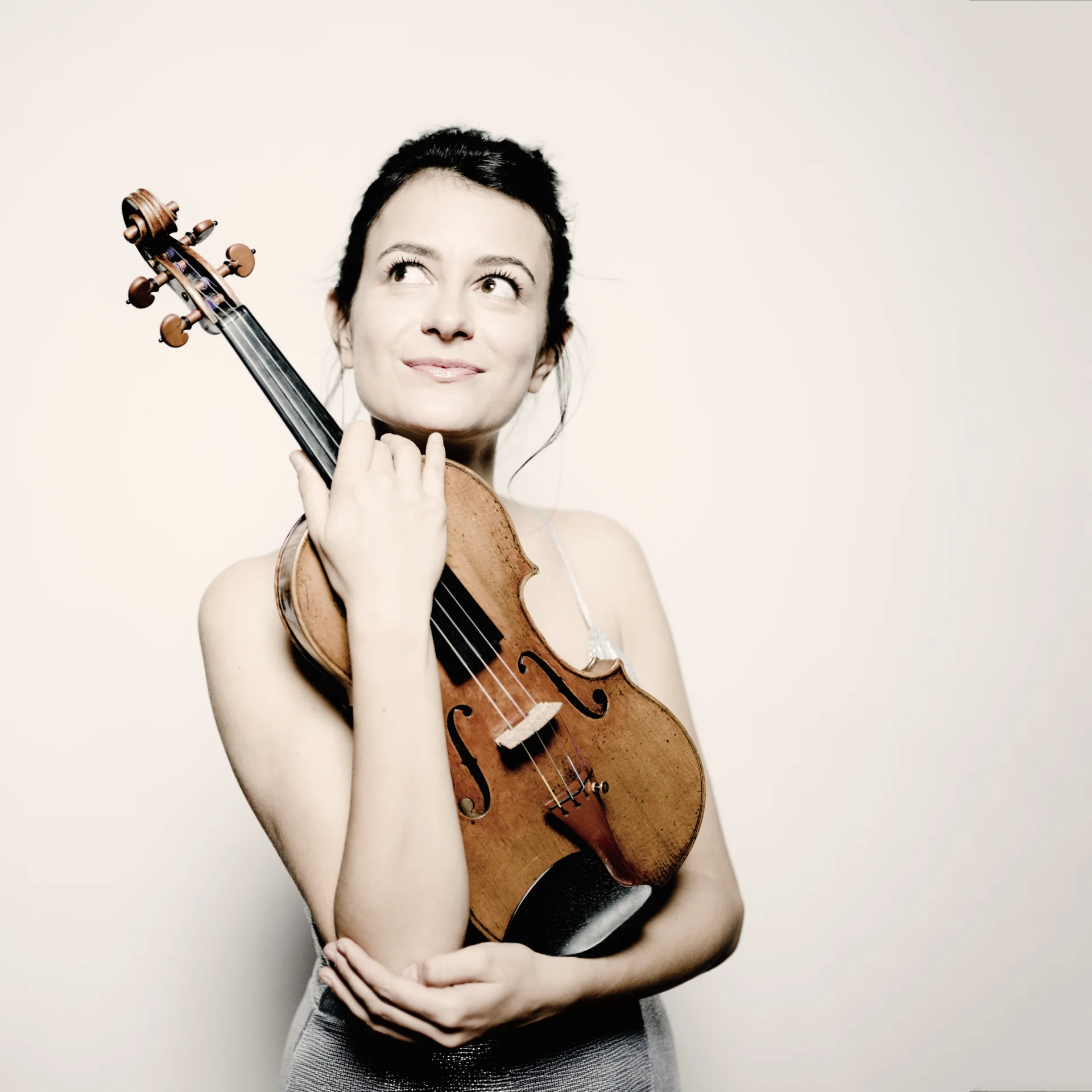 Liya Petrova holding her Violin.