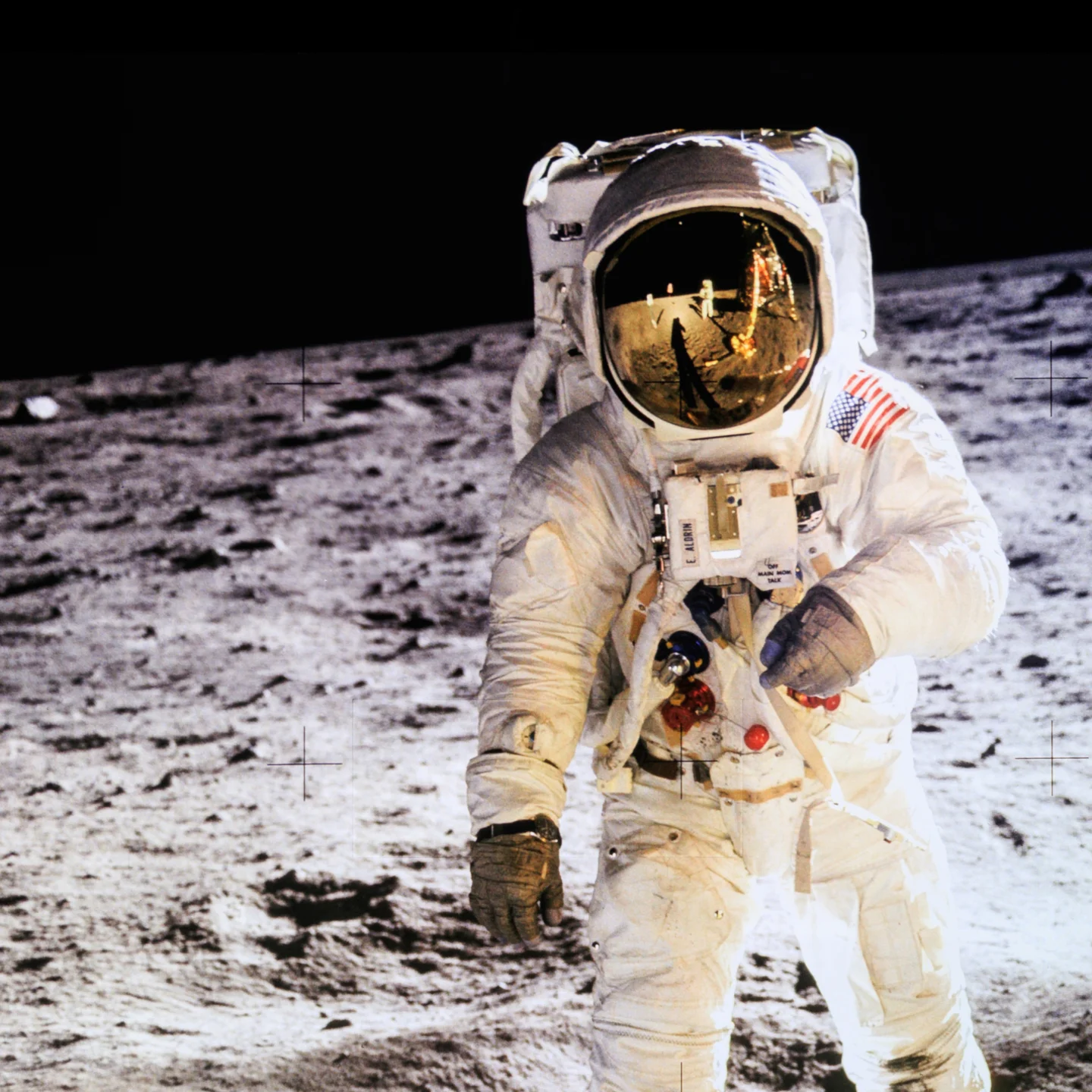 A picture of a NASA spaceman walking on the moon.