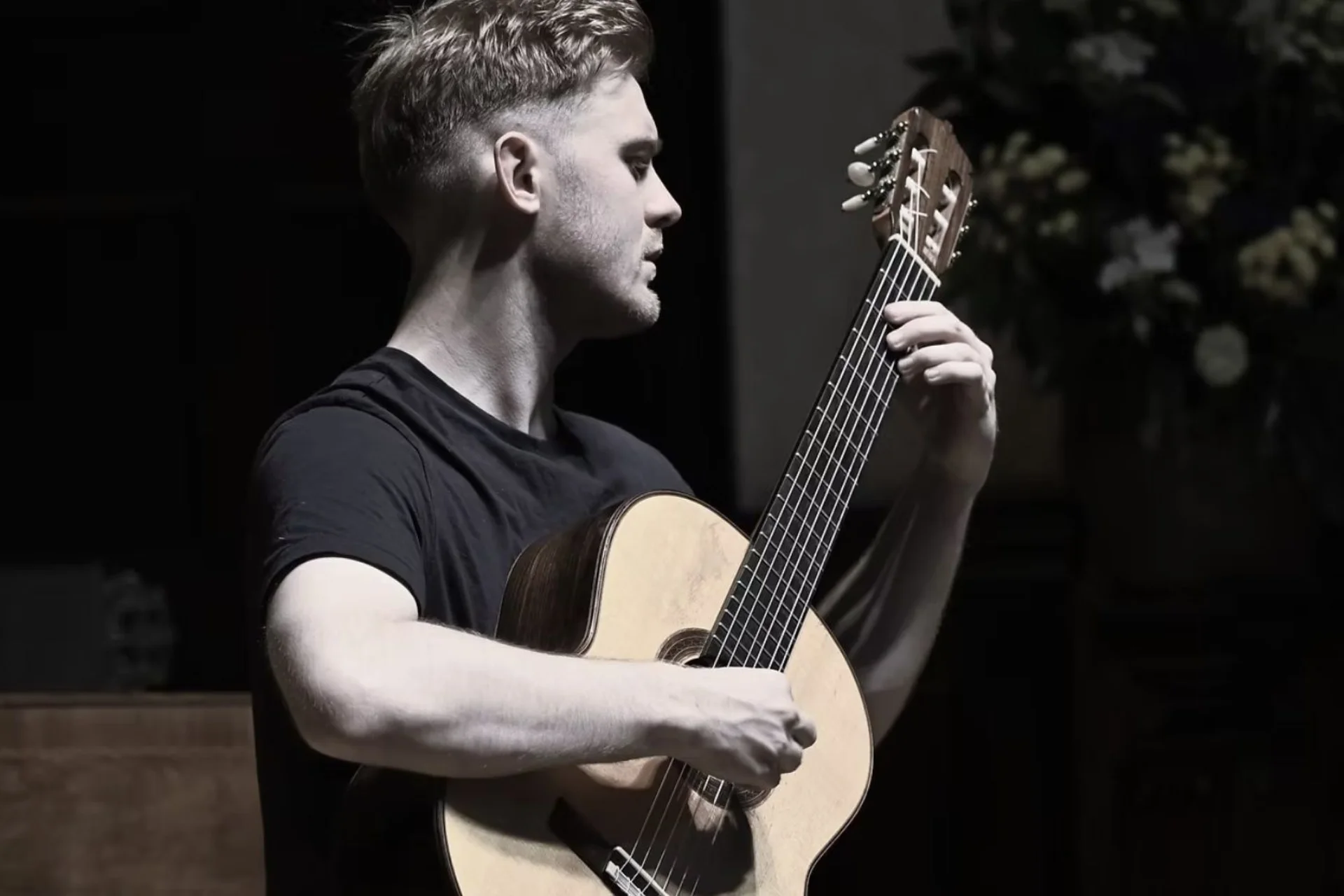Jack Hancher plays guitar