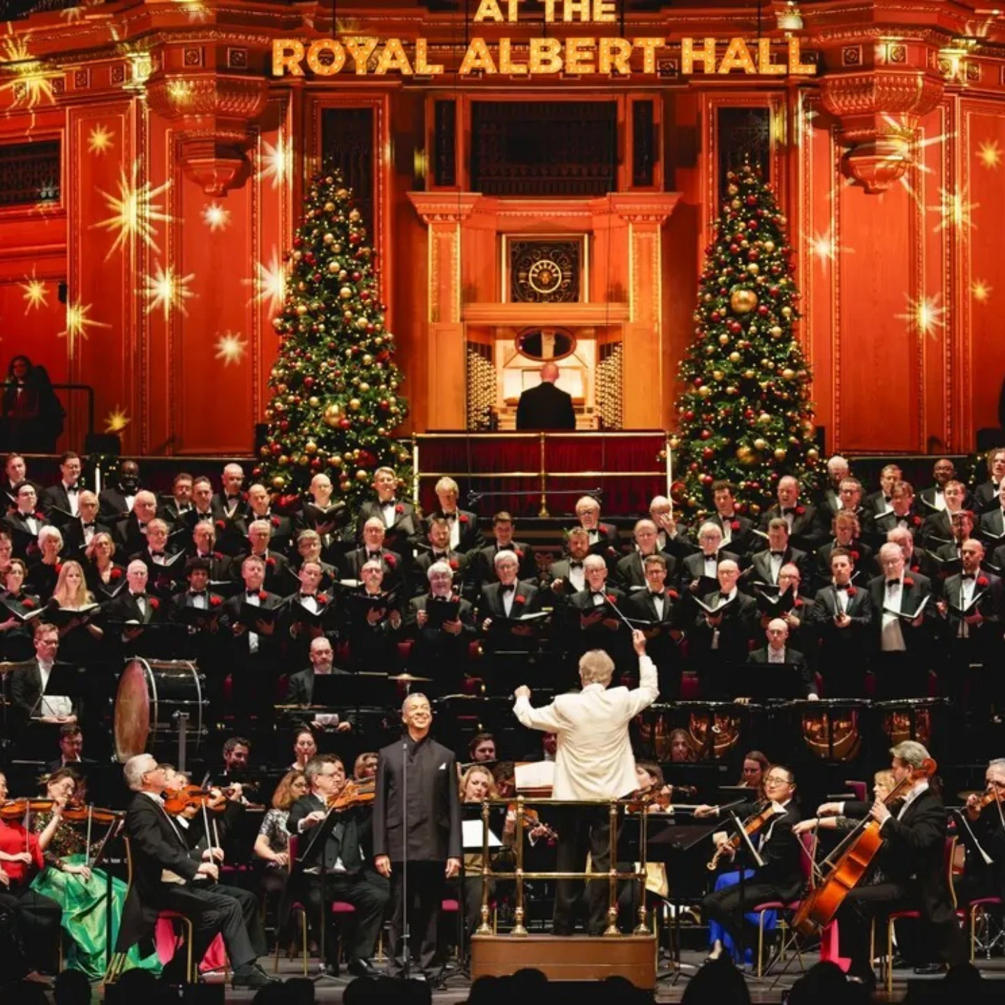 The Royal Philharmonic Orchestra onstage with the Royal Choral Society at the Royal Albert Hall.