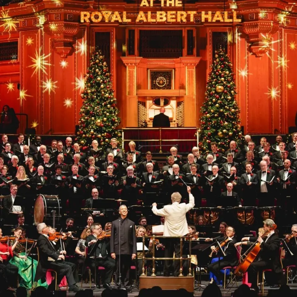 The Royal Philharmonic Orchestra onstage with the Royal Choral Society at the Royal Albert Hall.