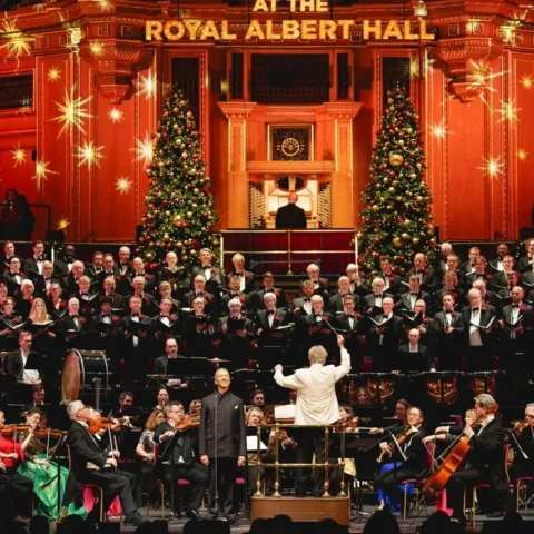 The Royal Philharmonic Orchestra onstage with the Royal Choral Society at the Royal Albert Hall.