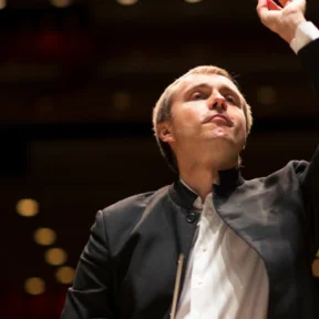 Close up of the RPO's Music Director Vasily Petrenko giving a musical cue.