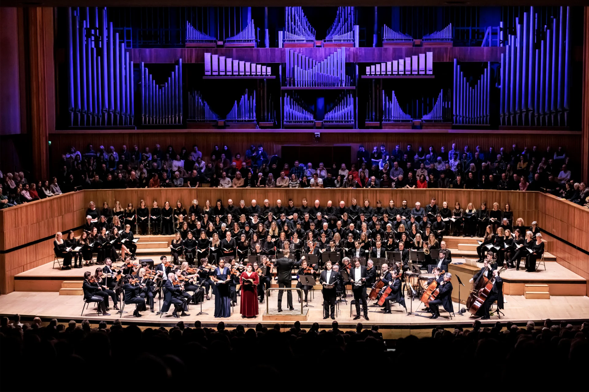 The Royal Philharmonic Concert Orchestra and a choir on stage at the Royal Festival Hall