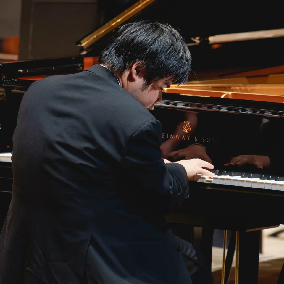 Nobuyuki Tsujii playing the piano on stage