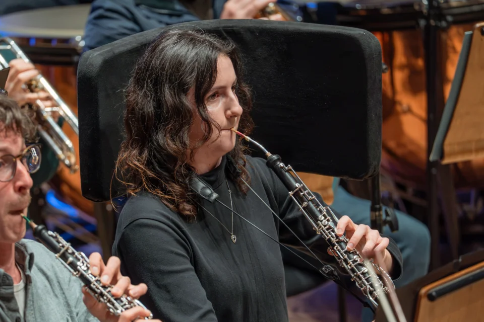 Henrietta playing the oboe in rehearsal at Cadogan Hall