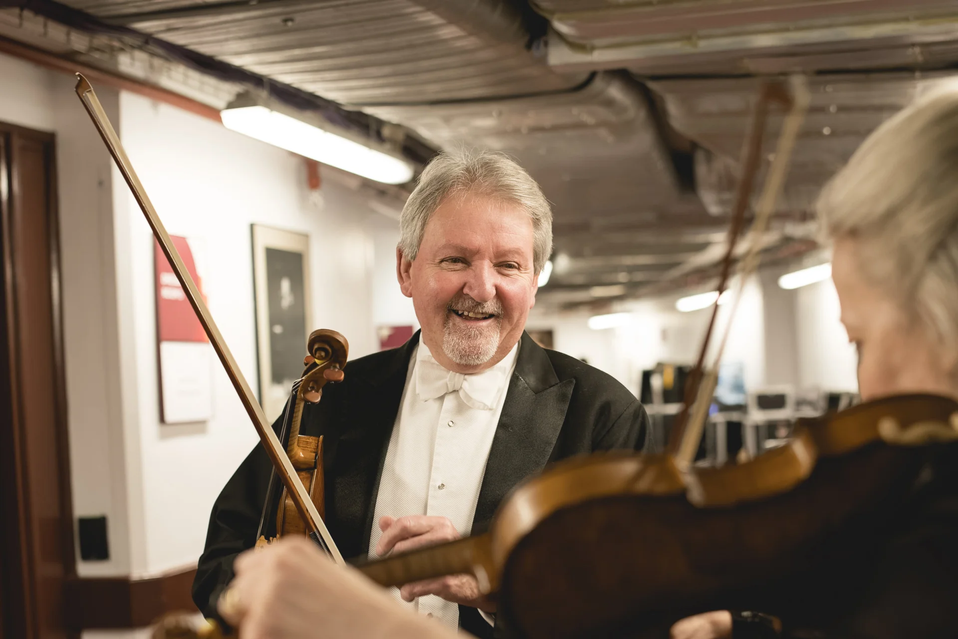 Andrew Klee with his violin backstage