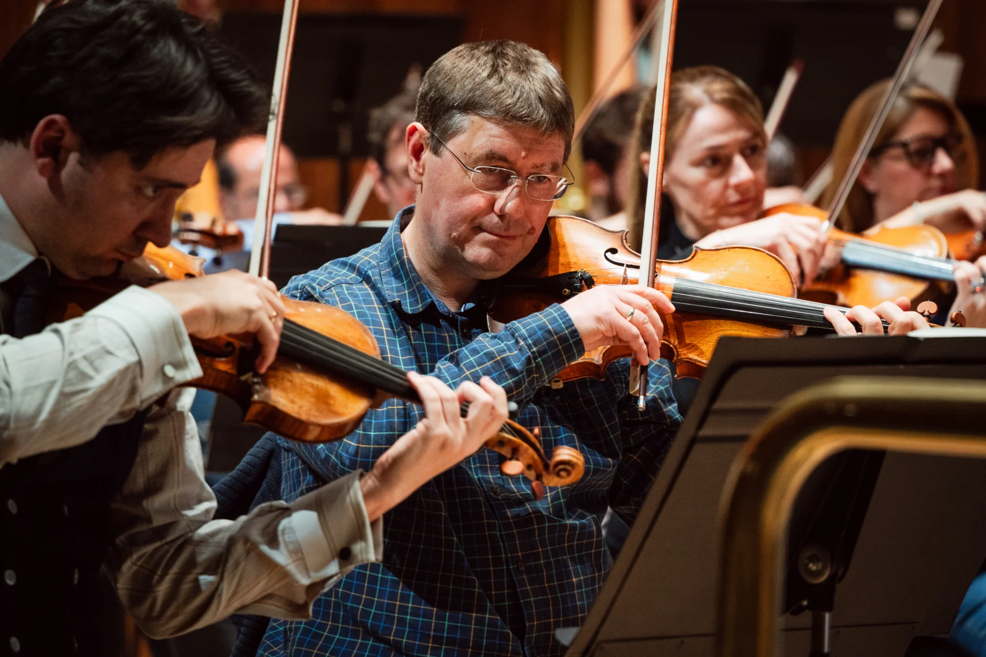 Violinist Tamas Andras playing in a rehearsal at Southbank Centre's Royal Festival Hall