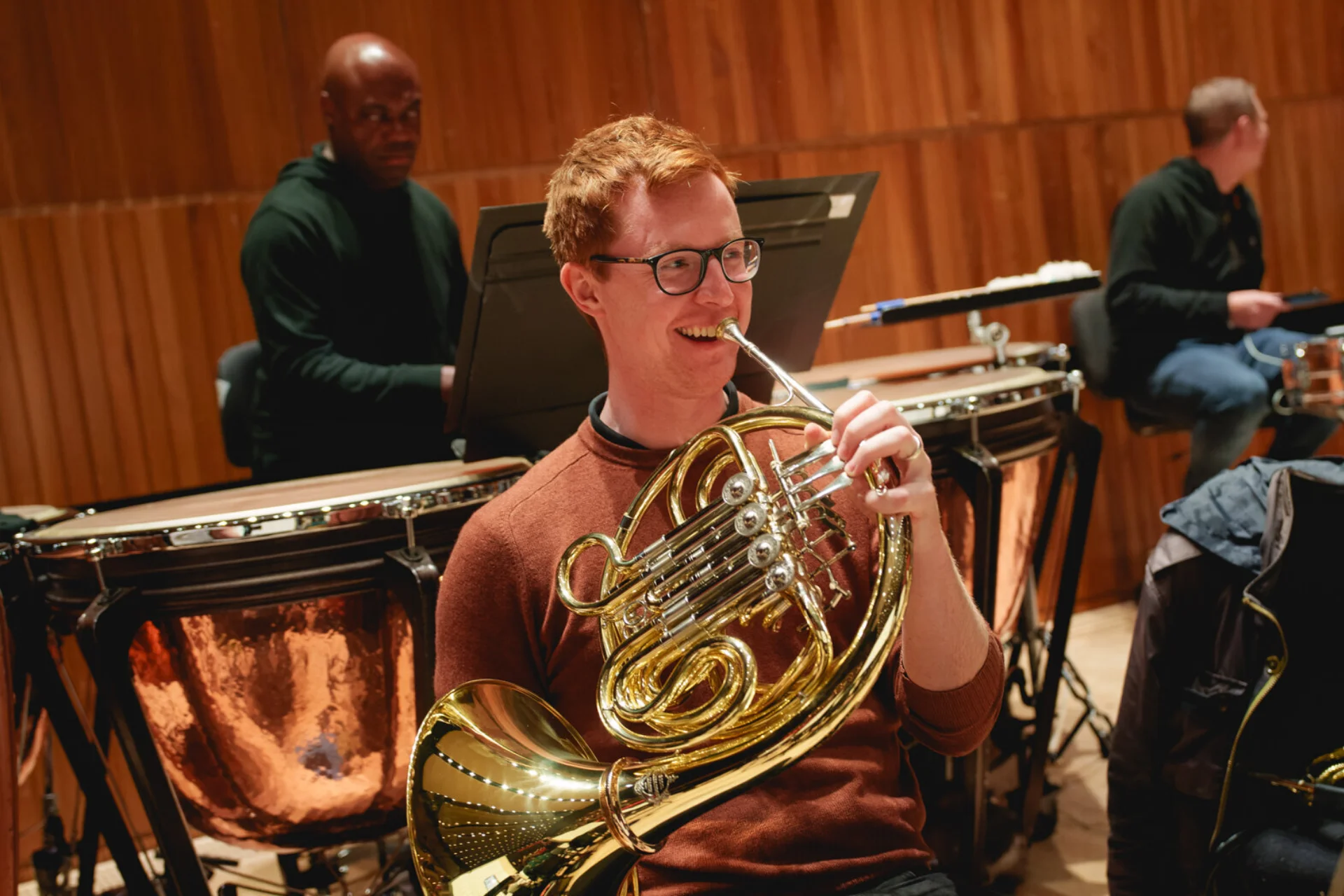 Finlay Bain smiling whilst holding horn