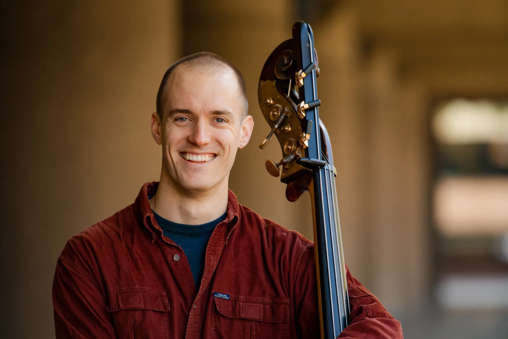 Martin standing with double bass to his left