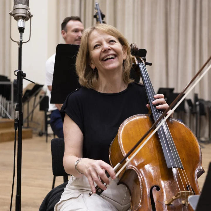 Chantal Woodhouse laughing with cello