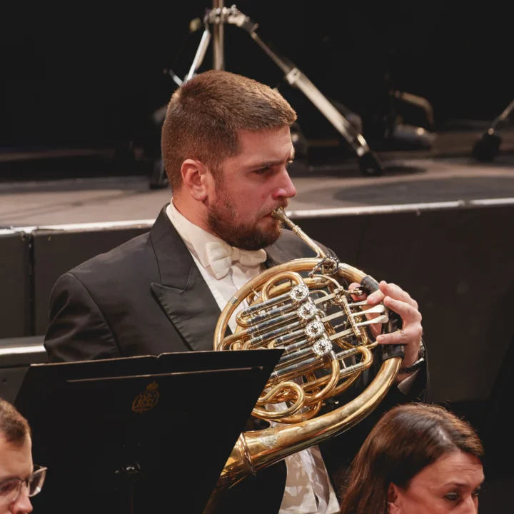 Ben Hulme playing the horn