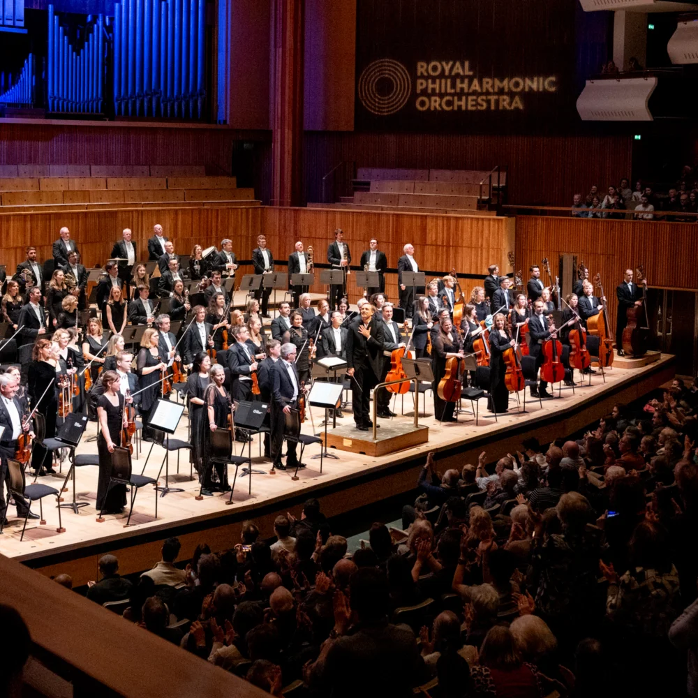 The RPP standing for applause on stage at the Royal Festival Hall
