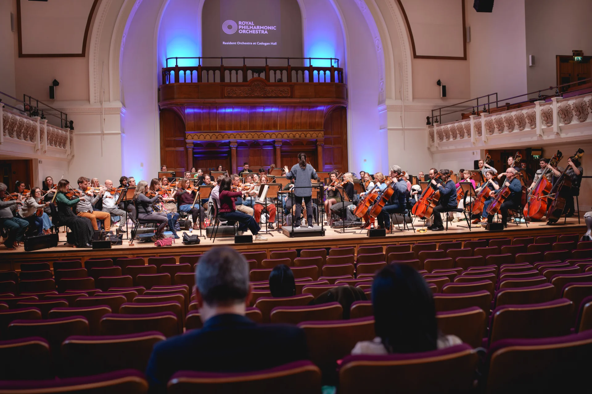 Michael Hayman and Min Kym sit in Cadogan Hall and watch the RPO rehearse on stage