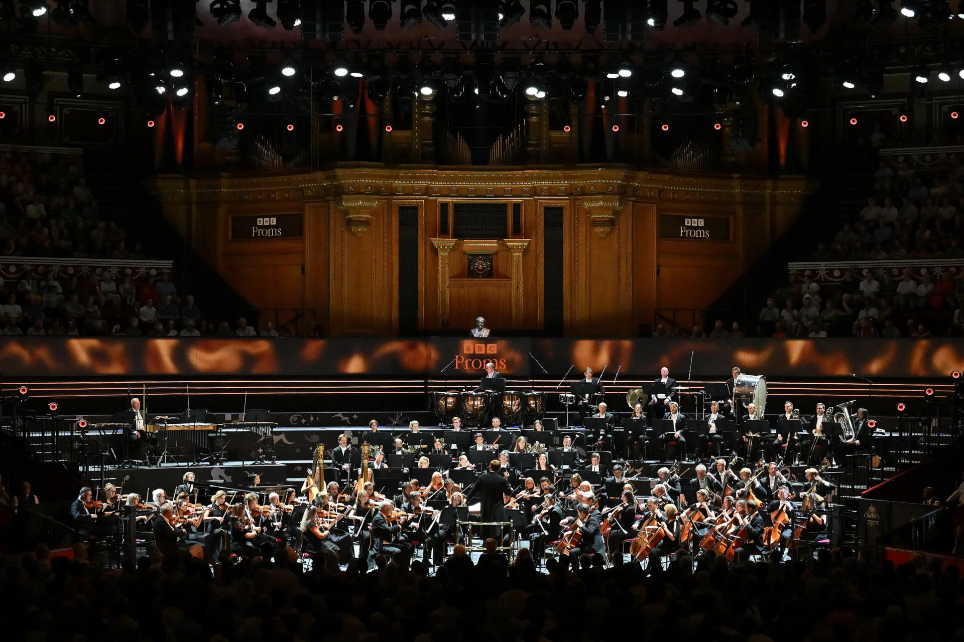 The Orchestra performing on stage at the Royal Albert Hall