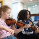 Participants playing instruments as a part of Brent Music Academy.