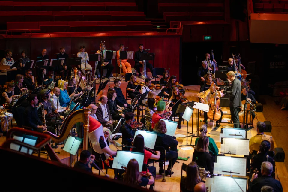 The RPO in space-themed costumes performing a Noisy Kids concert at Reading's The Hexagon