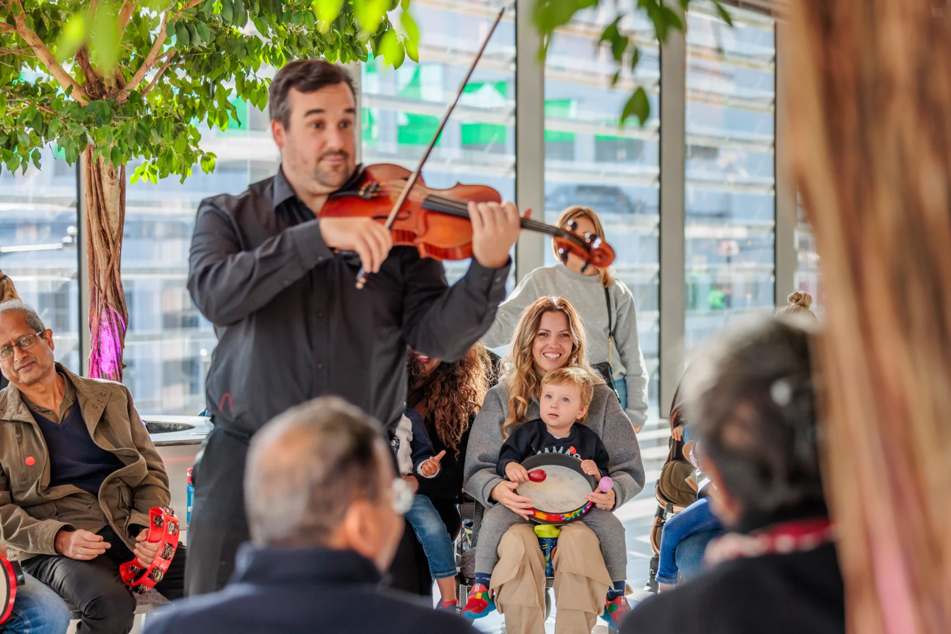 RPO Violinist Joseph Fisher plays for families at The Drum in the Brent Civic Centre as part of our Relaxed Performances