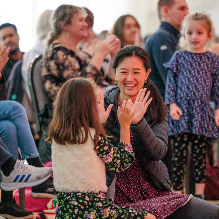 High fives in audience at Brent Relaxed Performance.