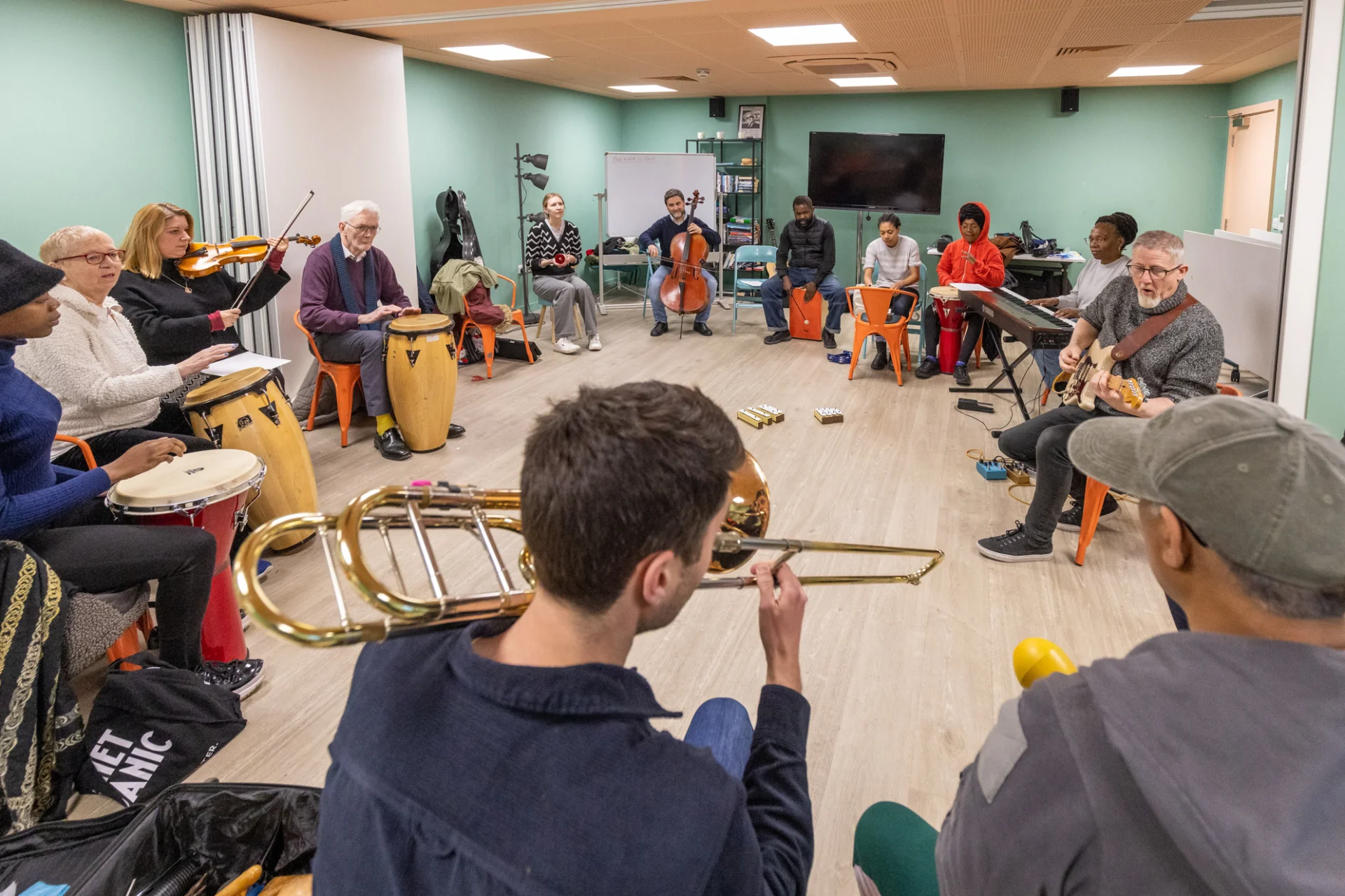 Sound Sanctuary participants playing instruments.