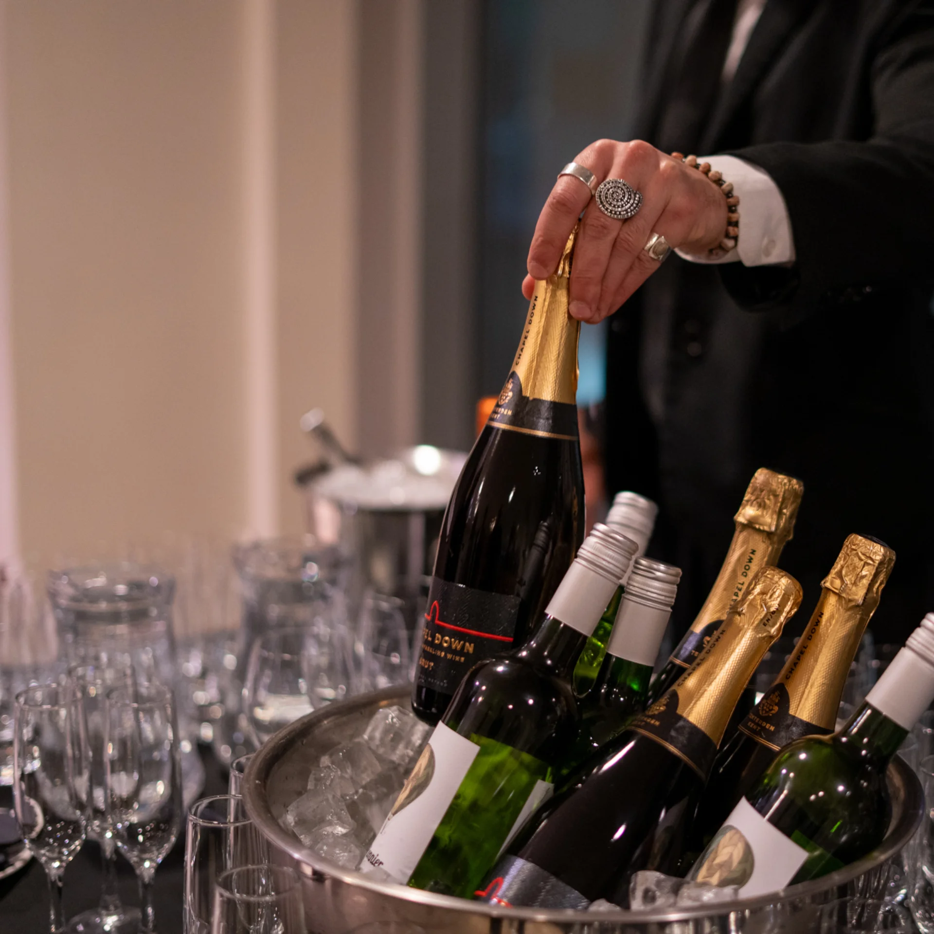 Image of Chapel Down English sparkling wine bottles in an ice bucket at an RPO reception at the Southbank Centre.